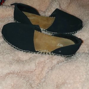 TOMS Black and tan shoes